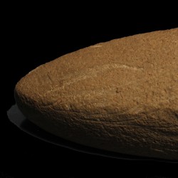 Kamenný, čiastočne prevŕtaný sekeromlat, eneolit.JPG